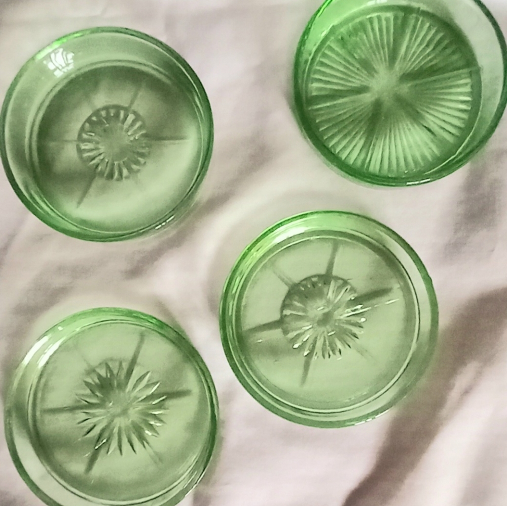 4 assorted green uranium glass coasters.